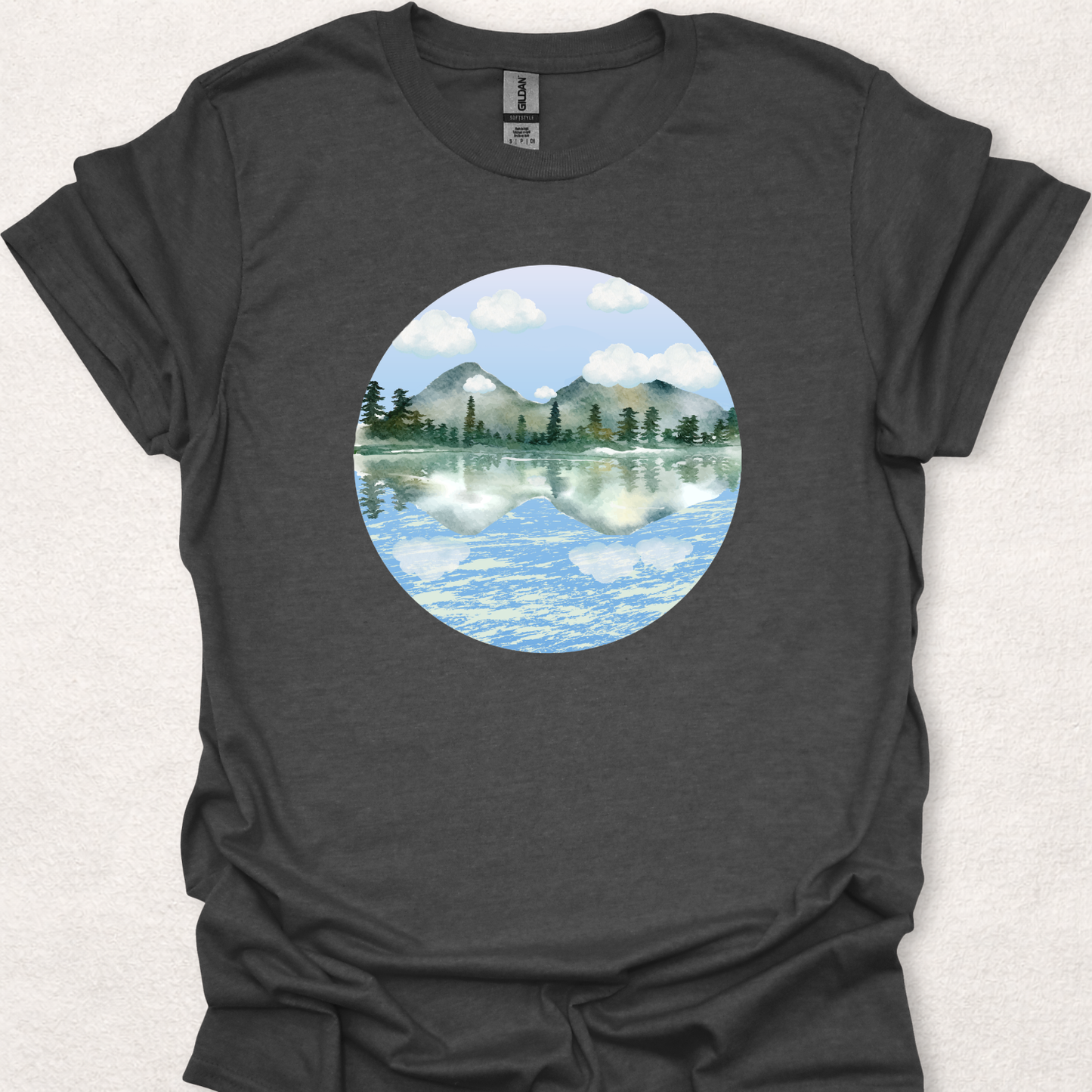 Dark Heather t-shirt featuring the Stillwater watercolor mountain lake reflection design.